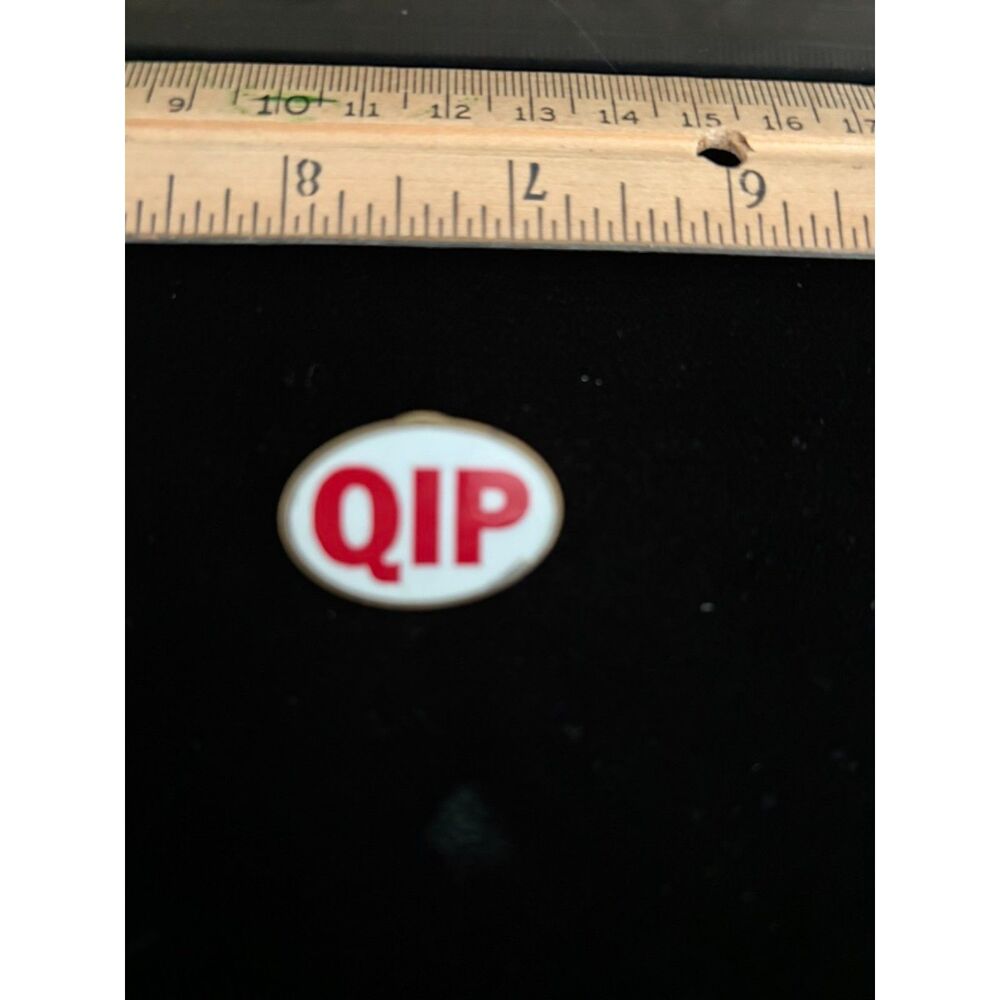 Small oval QIP promotional Label pin